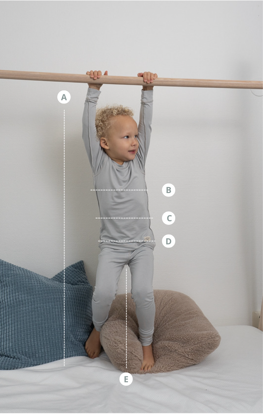 Boy Wearing Micro Chip Allergy-Friendly Clothing From SOOTHLA With Size Guide.