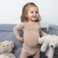 Toddler Wearing SOOTHLA Baby Top And Legging In Mahogany Rose.